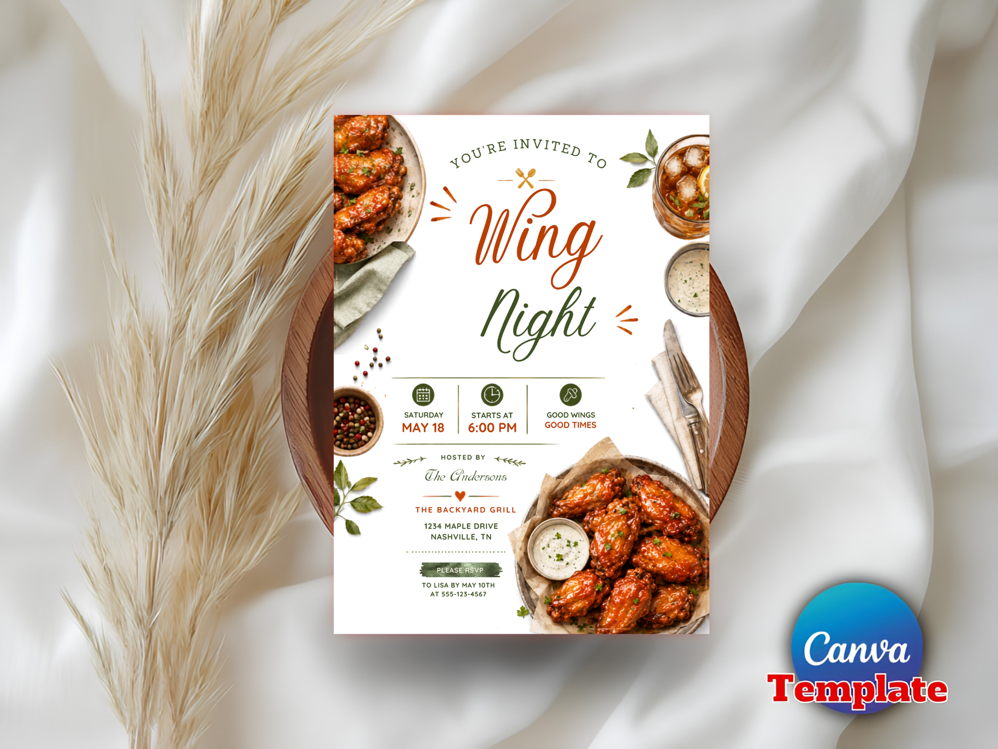 A rectangular wedding invitation card for 'Wing Night' is displayed on a wooden tray surrounded by dried pampas grass and white fabric. The card features appetizing photos of grilled chicken wings, cocktail sauce, and a dipping sauce, with elegant typography.