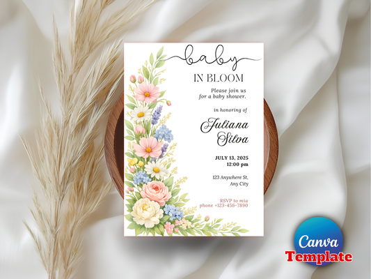 Wildflower baby shower invitation flat lay with dried wheat