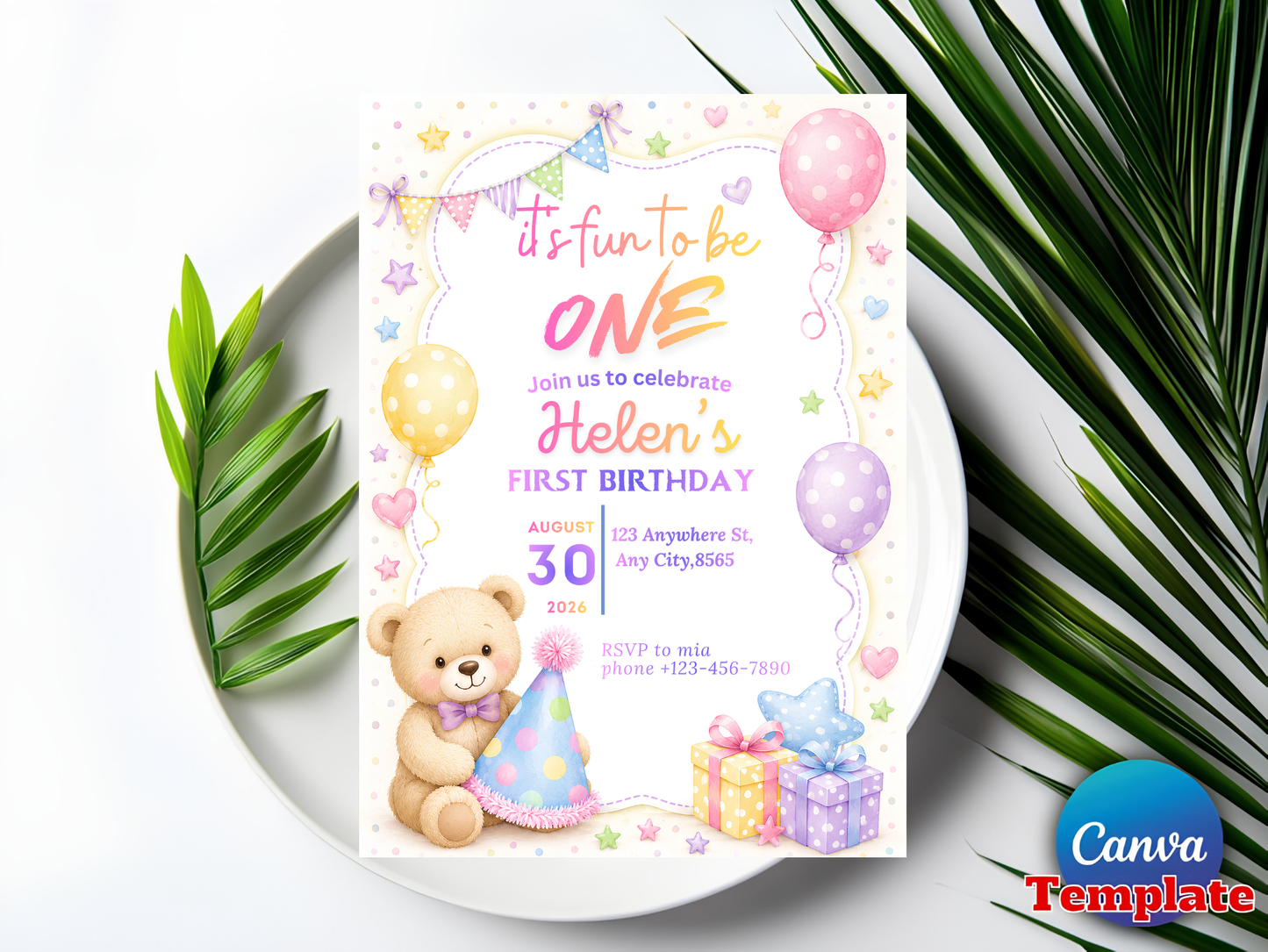 First birthday invitation on white plate with palm leaf