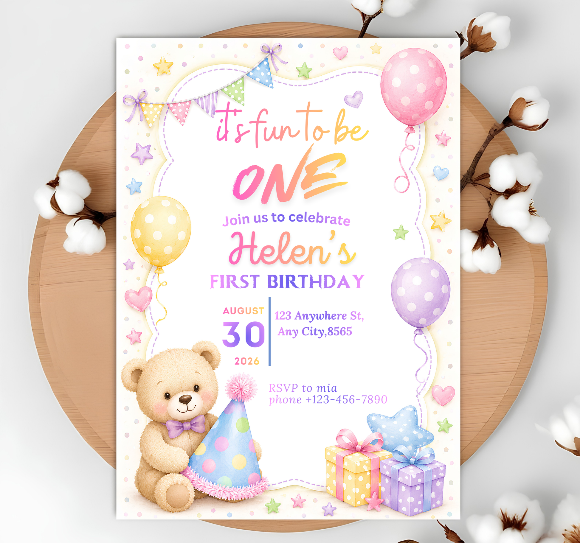 Teddy bear birthday invitation flat lay with cotton branch