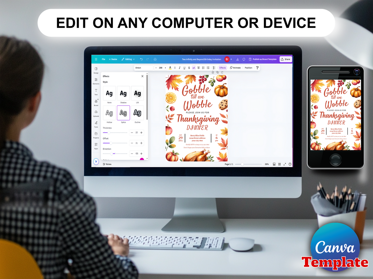 A person seated at a desk uses a computer and phone to edit a Thanksgiving dinner digital template. The screen shows autumn-themed graphics with pumpkins, leaves, and the text 'Gobble and Webble Thanksgiving Dinner.